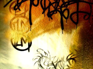 Abstract gold, amber, black, and ivory artwork suggesting the layered, diverse, and partly mysterious meanings of Love.